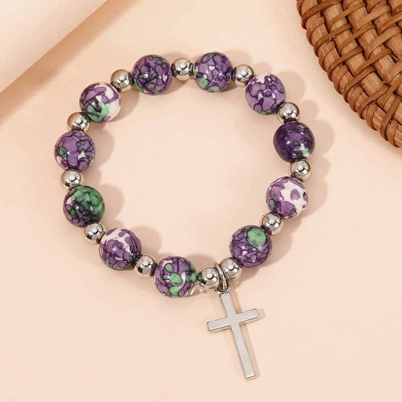 Bracciale con perline di preghiera e crocifisso Christianartworkshop con pietre viola - image 1