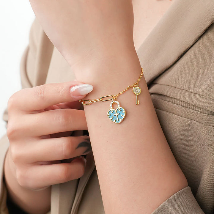 Christianartworkshop Bracciale con lucchetto a forma di cuore con croce turchese e chiave in zirconia - image 1