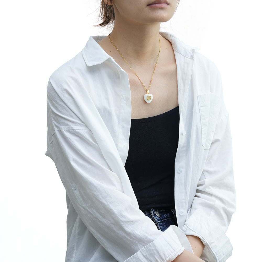 Collana con conchiglia a forma di cuore e medaglia di San Benedetto Christianartworkshop - image 2