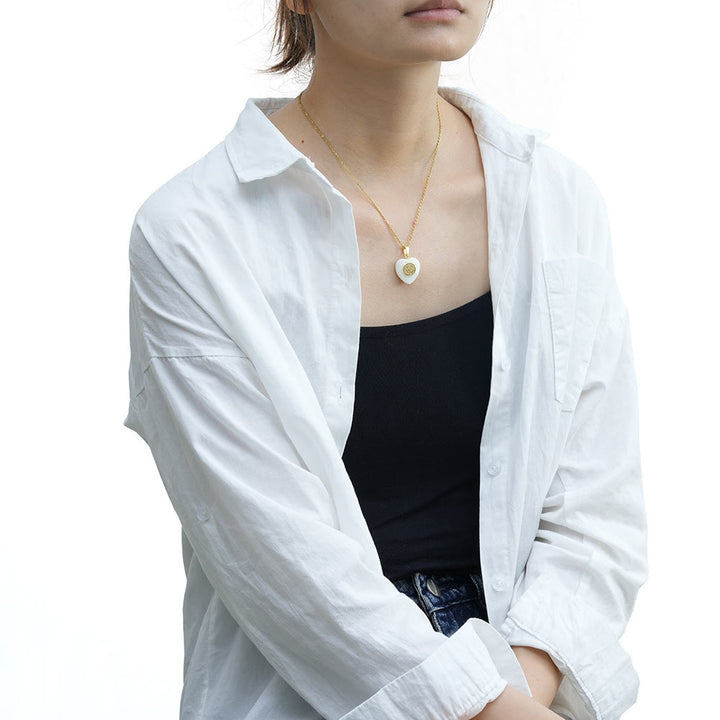 Collana con conchiglia a forma di cuore e medaglia di San Benedetto Christianartworkshop - image 2