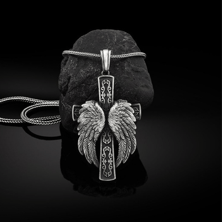 Collana cristiana con ciondolo in argento con croce alata Christianartworkshop - image 1