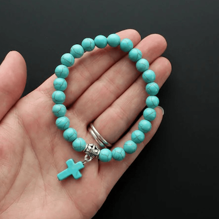 Bracciale con crocifisso in perline turchesi opache e satinate Christianartworkshop - image 2