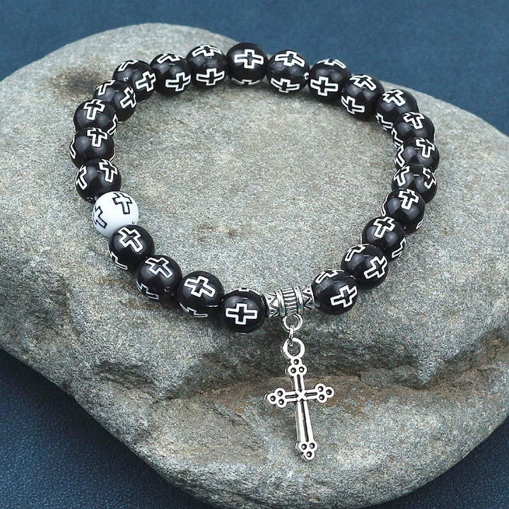 Bracciale con perline bianche e nere stampate a croce Christianartworkshop - image 1