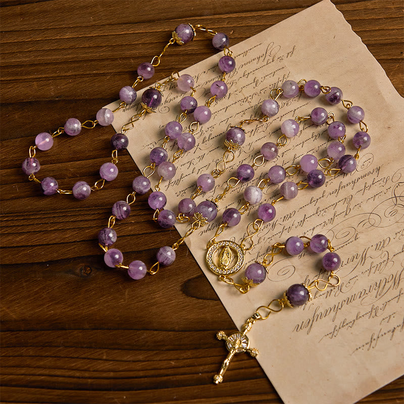 Christianartworkshop Rosario rotondo in cristallo viola da 8 mm con crocifisso e Madonna di Guadalupe - image 1