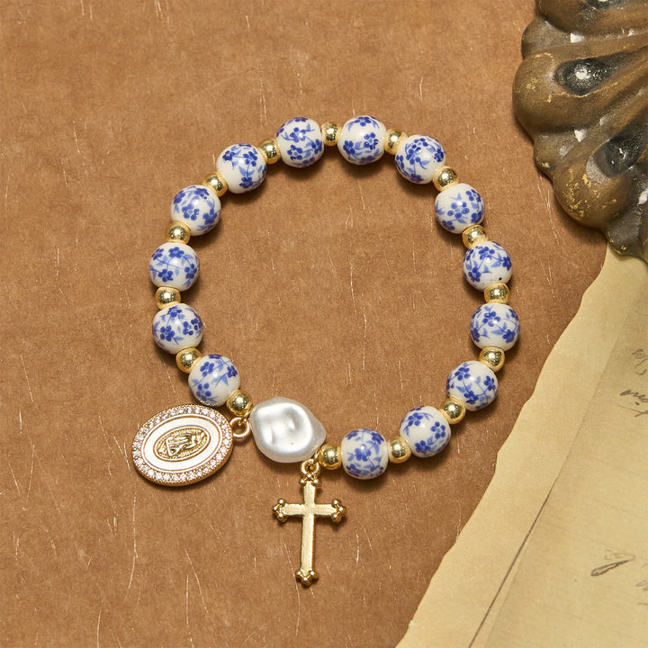 Bracciale con medaglia e croce della Madonna Christianartworkshop ispirato ai fiori: la fede incontra lo stile - image 2