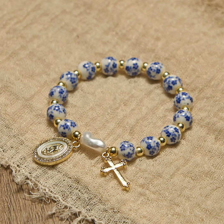 Bracciale con medaglia e croce della Madonna Christianartworkshop ispirato ai fiori: la fede incontra lo stile - image 3