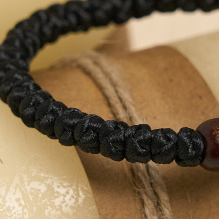 Christianartworkshop Bracciale con nodo a croce blu e nera: un segno di fede - image 9