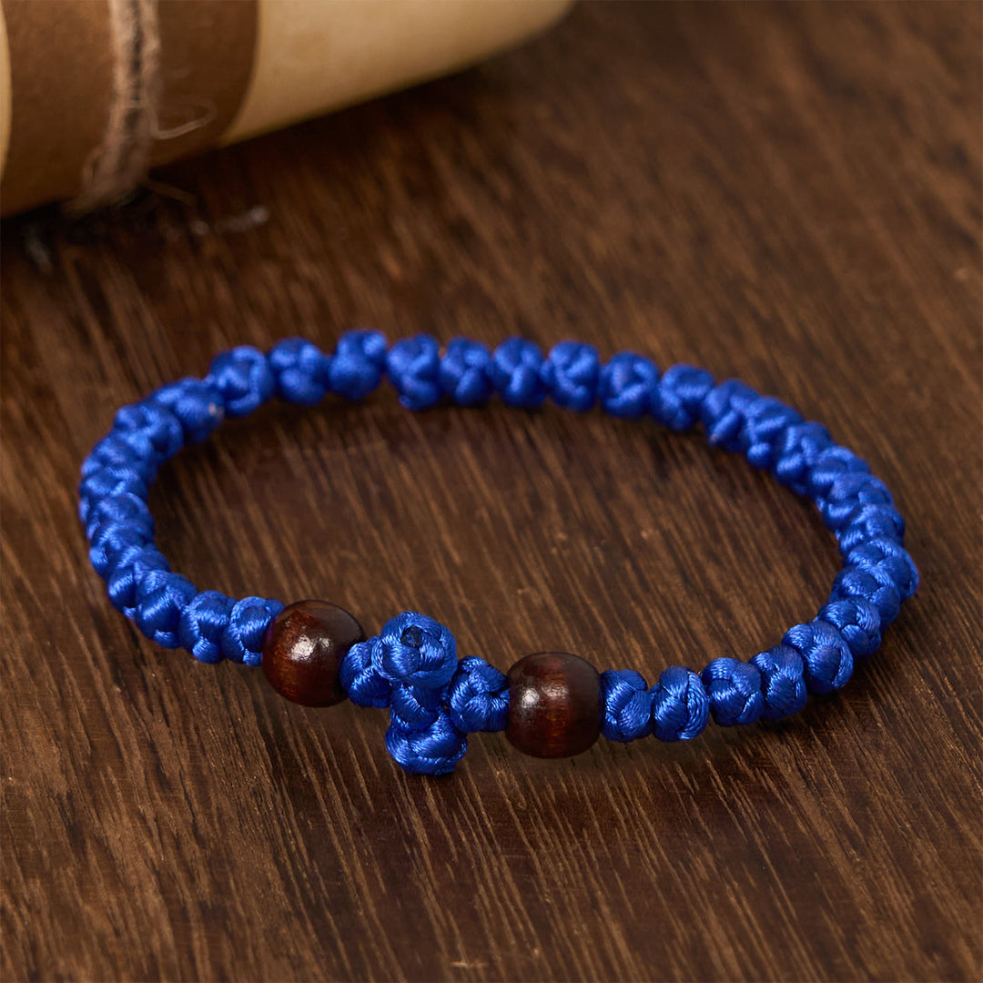 Christianartworkshop Bracciale con nodo a croce blu e nera: un segno di fede - image 11