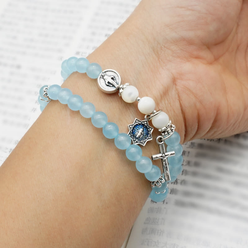 Bracciale minimalista con medaglia miracolosa e crocifisso con perline azzurre da 6 mm Christianartworkshop : un simbolo di fede - image 1