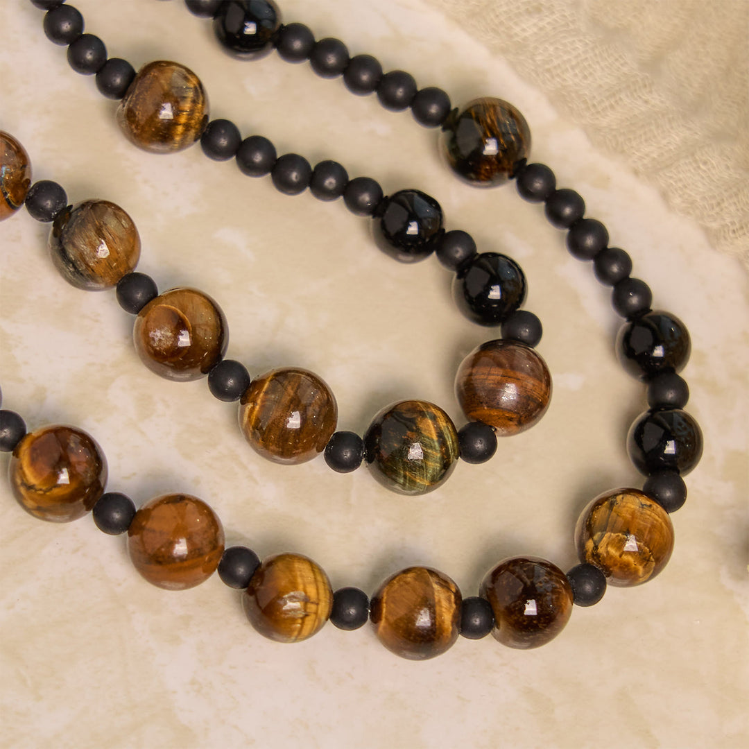 Rosario con perline in pietra occhio di tigre da 10 mm Christianartworkshop e crocifisso in smalto nero: abbraccia la sacralità terrena - image 7