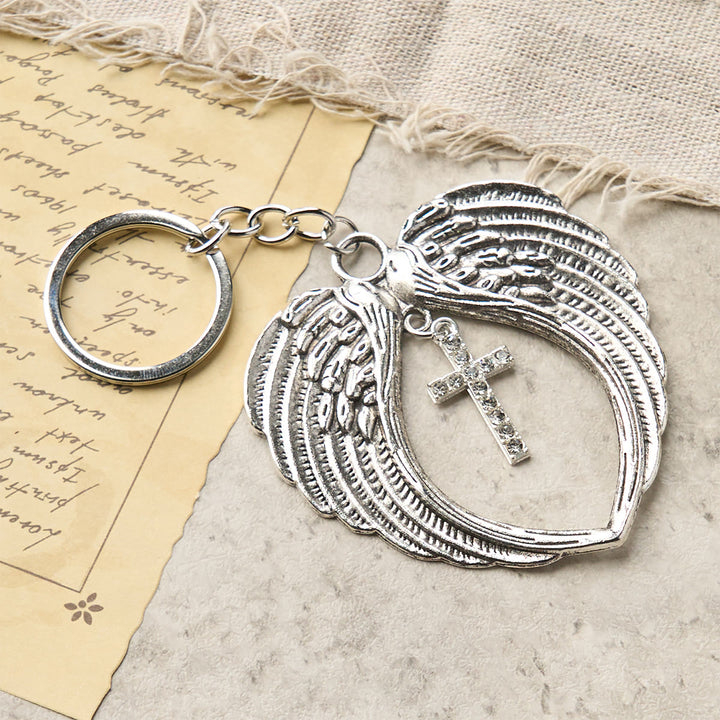 Christianartworkshop Ali d'angelo a forma di cuore in argento con croce o ciondolo: un simbolo di amore e protezione - image 2