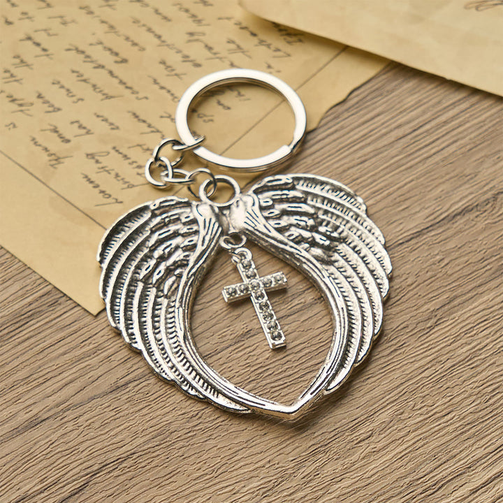 Christianartworkshop Ali d'angelo a forma di cuore in argento con croce o ciondolo: un simbolo di amore e protezione - UN - image 0