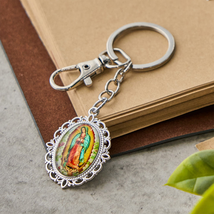 Portachiavi con medaglia della Madonna Christianartworkshop con motivi di colombe e fiori: ideale come regalo per il battesimo - Fiore incorniciato - image 4