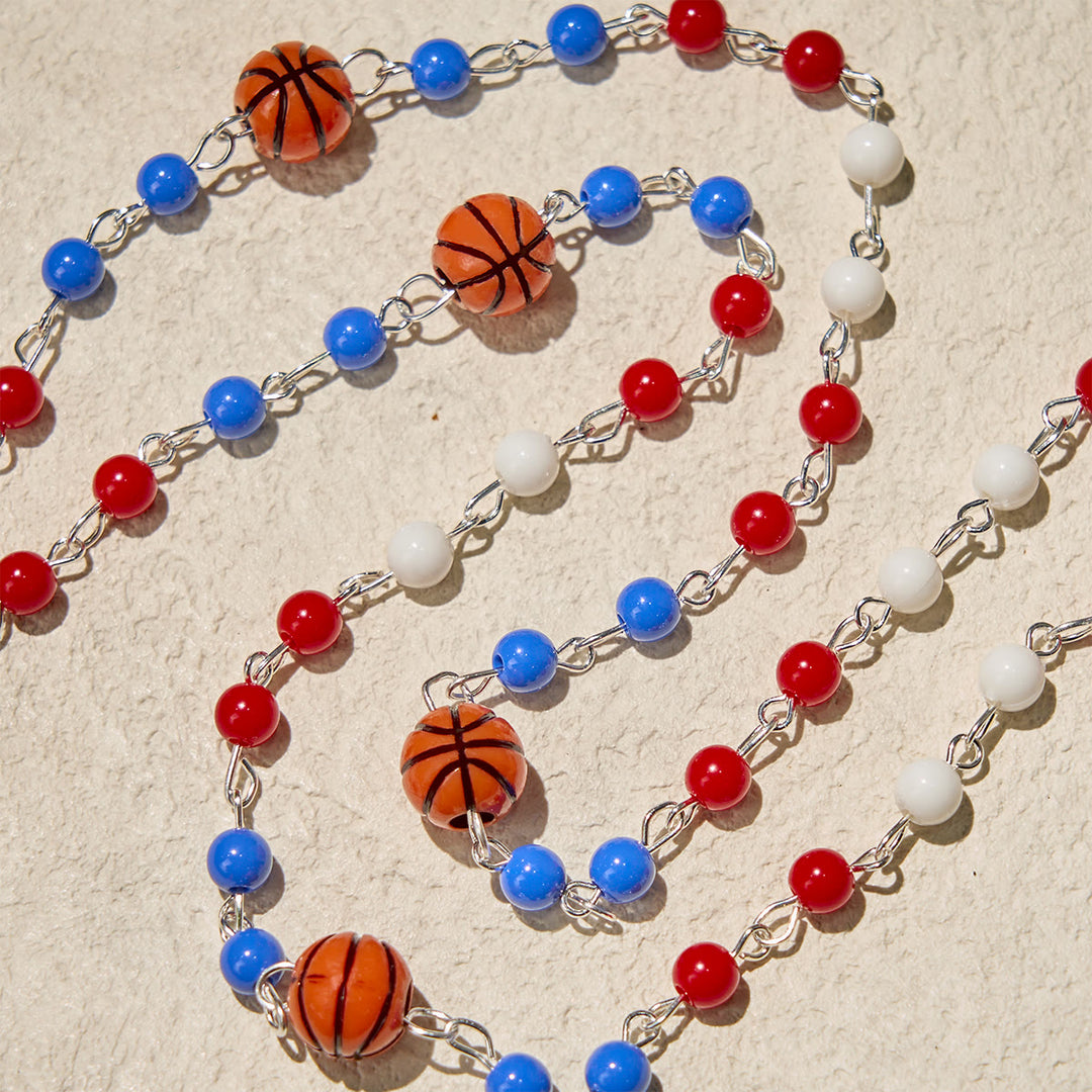 Perline ispirate al basket patriottico di Christianartworkshop con rosario di San Benedetto per la fede sportiva - image 5