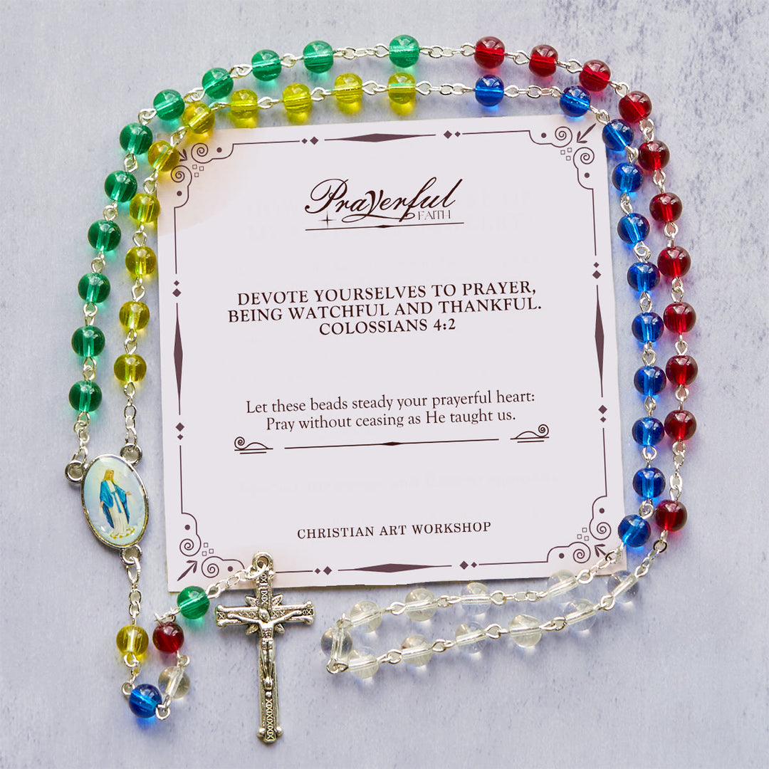 Christianartworkshop FEDE IN PREGHIERA: Rosario con perline arcobaleno multicolor trasparenti da 6 mm con carta regalo - La Madonna e il Crocifisso - image 0
