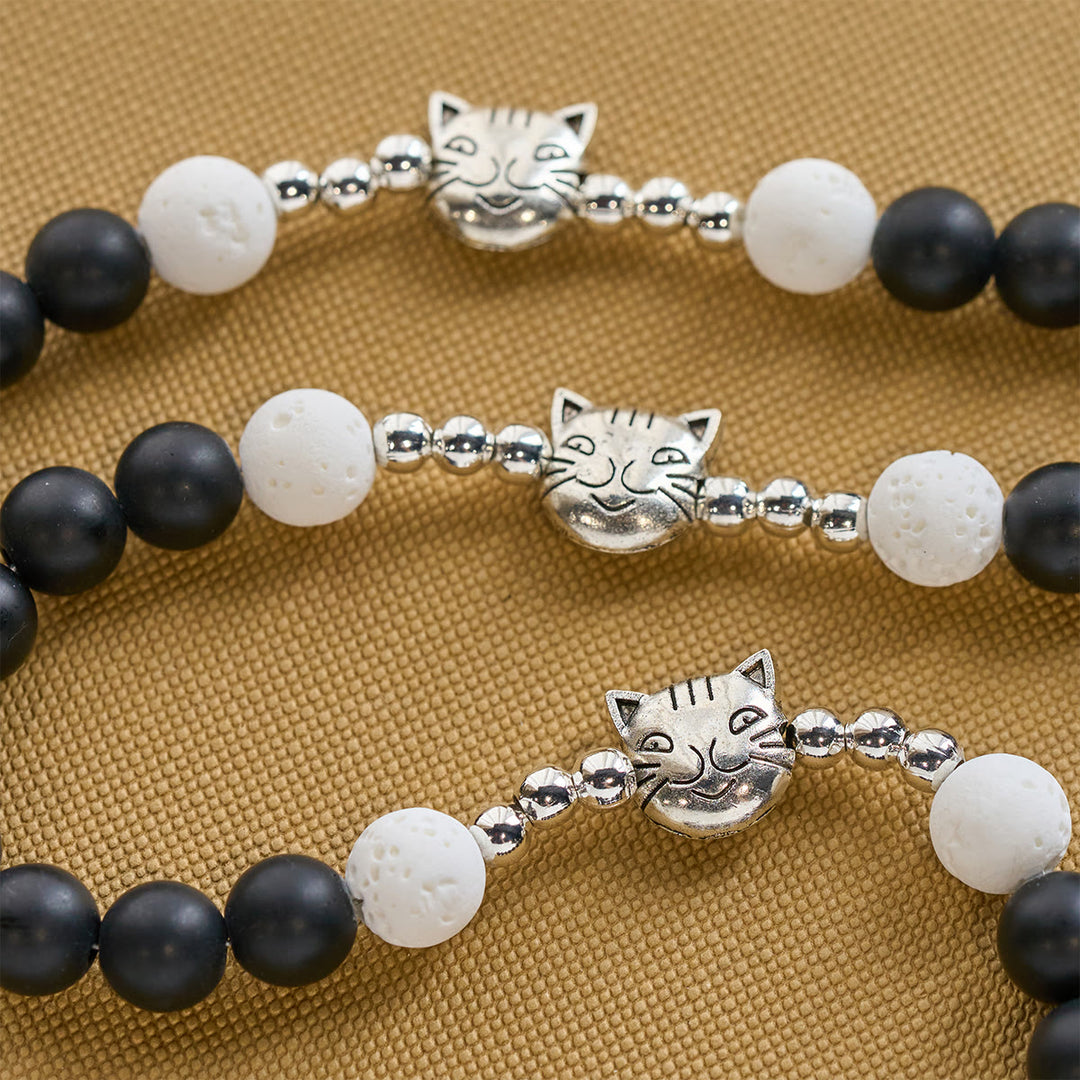 Christianartworkshop Braccialetto con ciondolo a forma di gatto e mucca in pietra lavica nera e bianca opaca e rosario con animali  - image 8