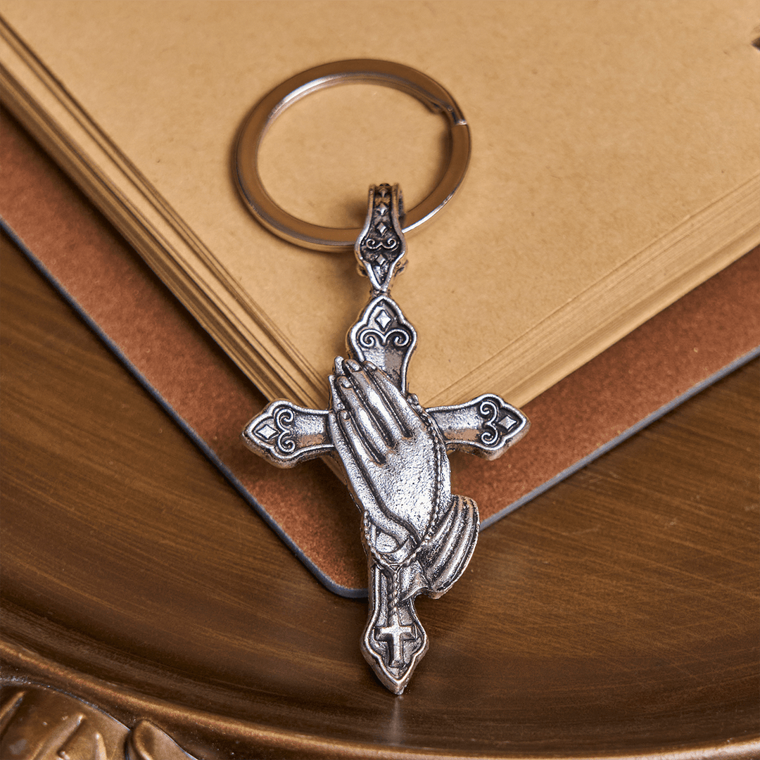 Christianartworkshop Fede in ogni passo Portachiavi con croce e mani in preghiera in tasca - Mani in preghiera - image 0