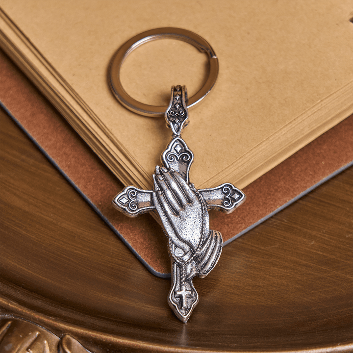 Christianartworkshop Fede in ogni passo Portachiavi con croce e mani in preghiera in tasca - Mani in preghiera - image 0