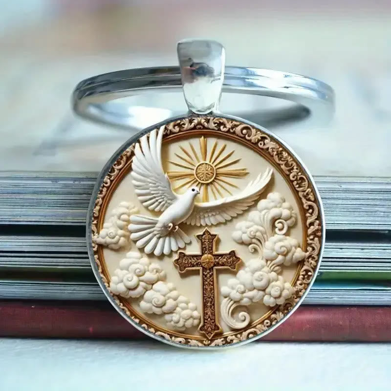 Christianartworkshop Portachiavi a forma di croce colomba in argento minimalista: un sottile ricordo dell'amore divino - image 1