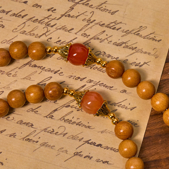 Rosario di sandalo per la devozione del Ringraziamento Christianartworkshop con gemme di zucca Golden Grace e Santo Graal - image 5