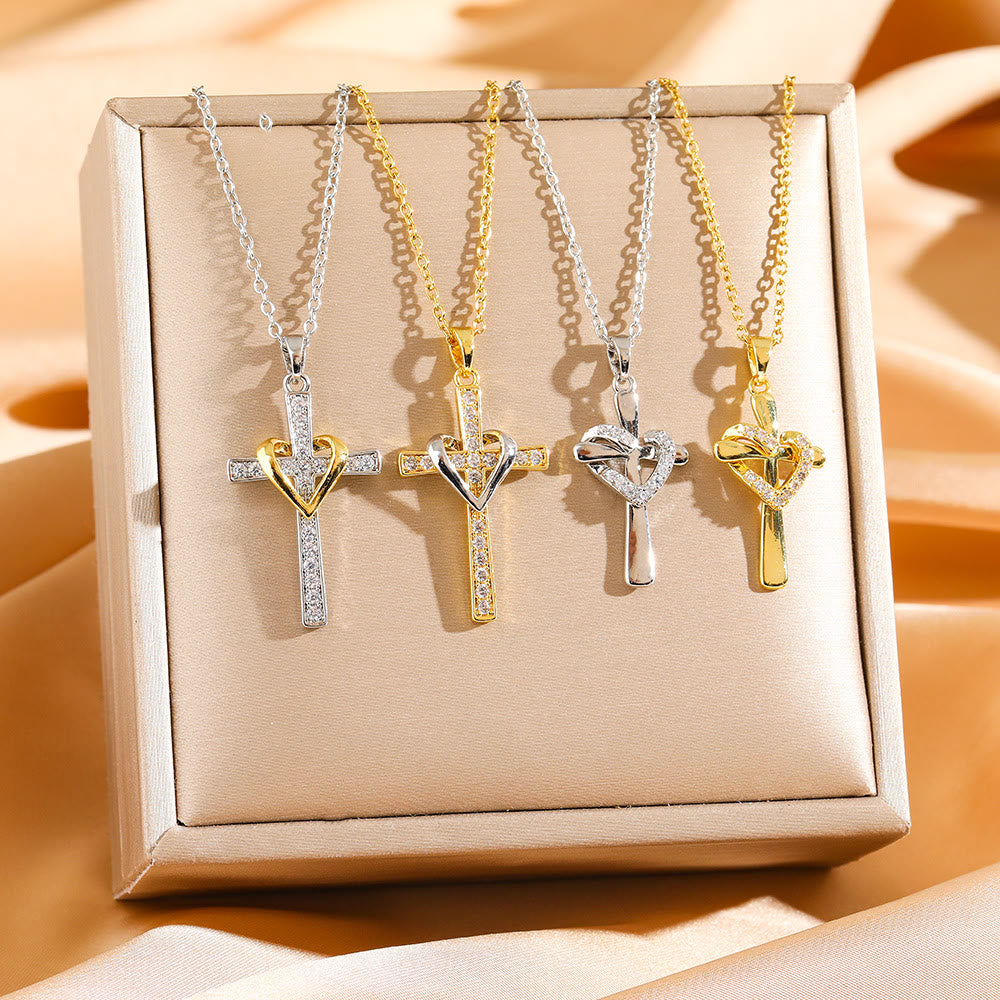 Christianartworkshop Collana bicolore con cuore e croce e zirconi: fusione di amore e fede - image 0