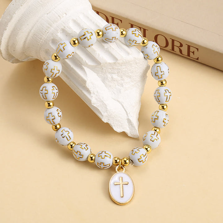 Christianartworkshop Bracciale elegante con perline a croce bianche e dorate: pura grazia ogni giorno - image 3