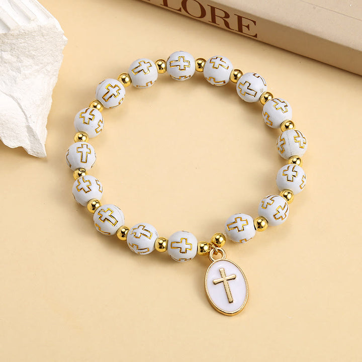 Christianartworkshop Bracciale elegante con perline a croce bianche e dorate: pura grazia ogni giorno - image 4
