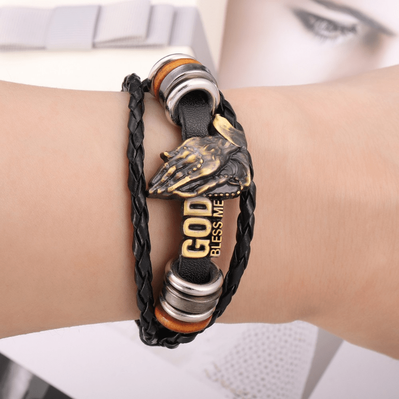 Christianartworkshop Braccialetto con mani in preghiera in stile retrò, DIO MI BENEDICA, design intrecciato nero - image 1