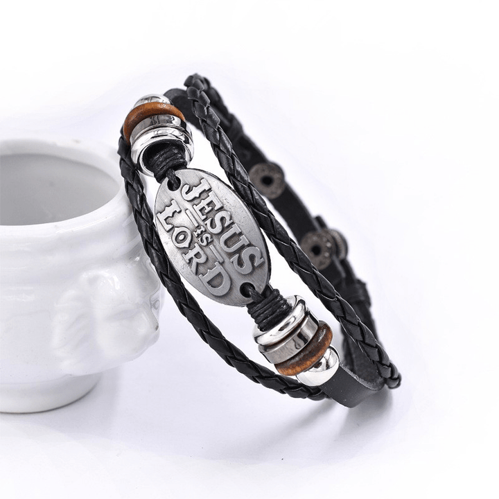 Bracciale in pelle intrecciata nera Christianartworkshop con iscrizione JESUS IS SIGNOR - image 5