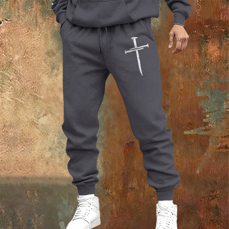 Pantaloni della tuta con croce e spada di Christianartworkshop: fede elegante per i momenti quotidiani - image 1