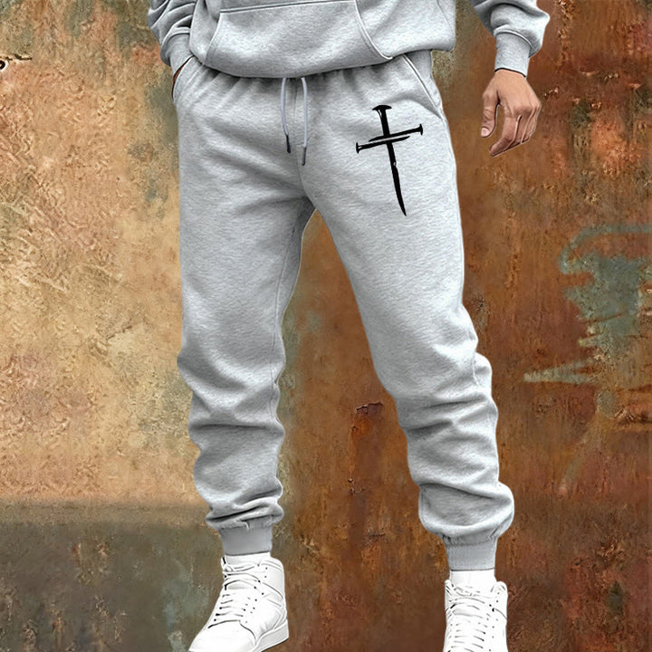 Pantaloni della tuta con croce e spada di Christianartworkshop: fede elegante per i momenti quotidiani - image 14
