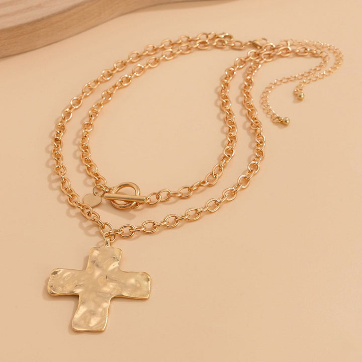 Collana della serie Hammered Cross di Christianartworkshop: fede contemporanea e devozione elegante - image 1