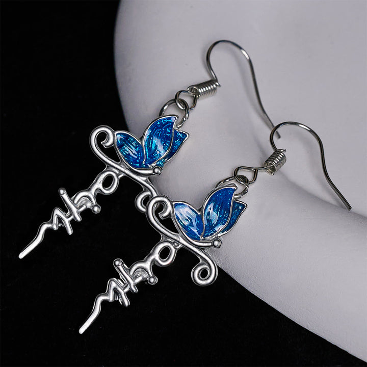 Set di gioielli con croce a farfalla di Christianartworkshop: devozione e simbolismo artistico - Orecchini - image 2