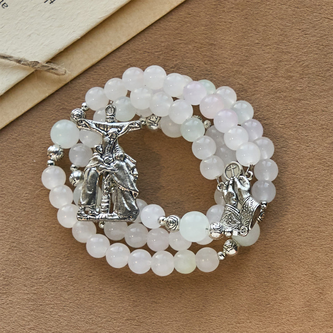 Rosario pastello con crocifisso e mani in preghiera che cambiano colore con luce UV di Christianartworkshop - image 12