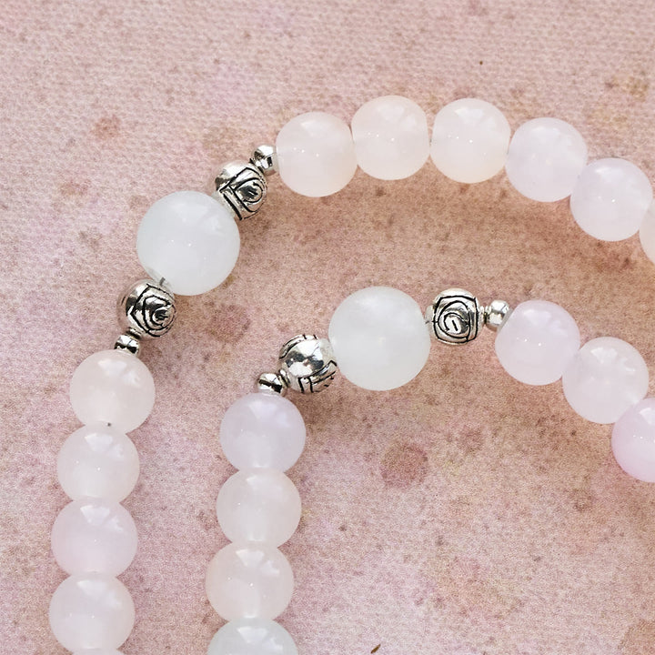 Rosario pastello con crocifisso e mani in preghiera che cambiano colore con luce UV di Christianartworkshop - image 11