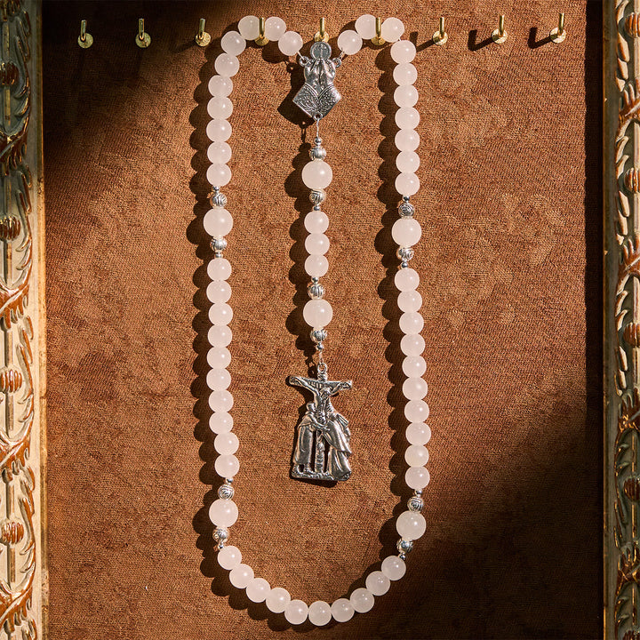 Rosario pastello con crocifisso e mani in preghiera che cambiano colore con luce UV di Christianartworkshop - image 6