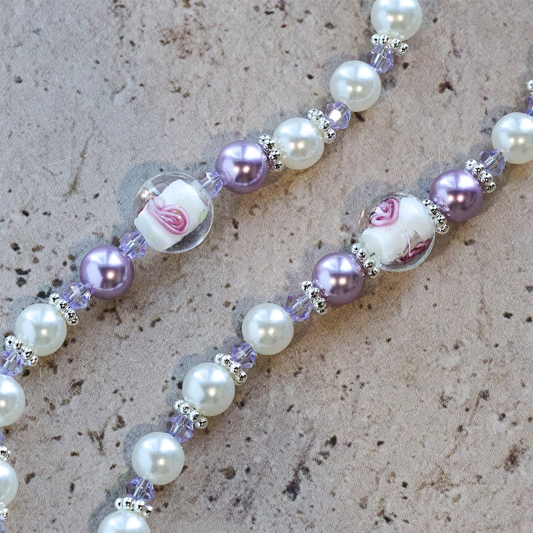 Rosario con perline floreali dai toni tenui Christianartworkshop : fede quotidiana e devozione significativa - image 9