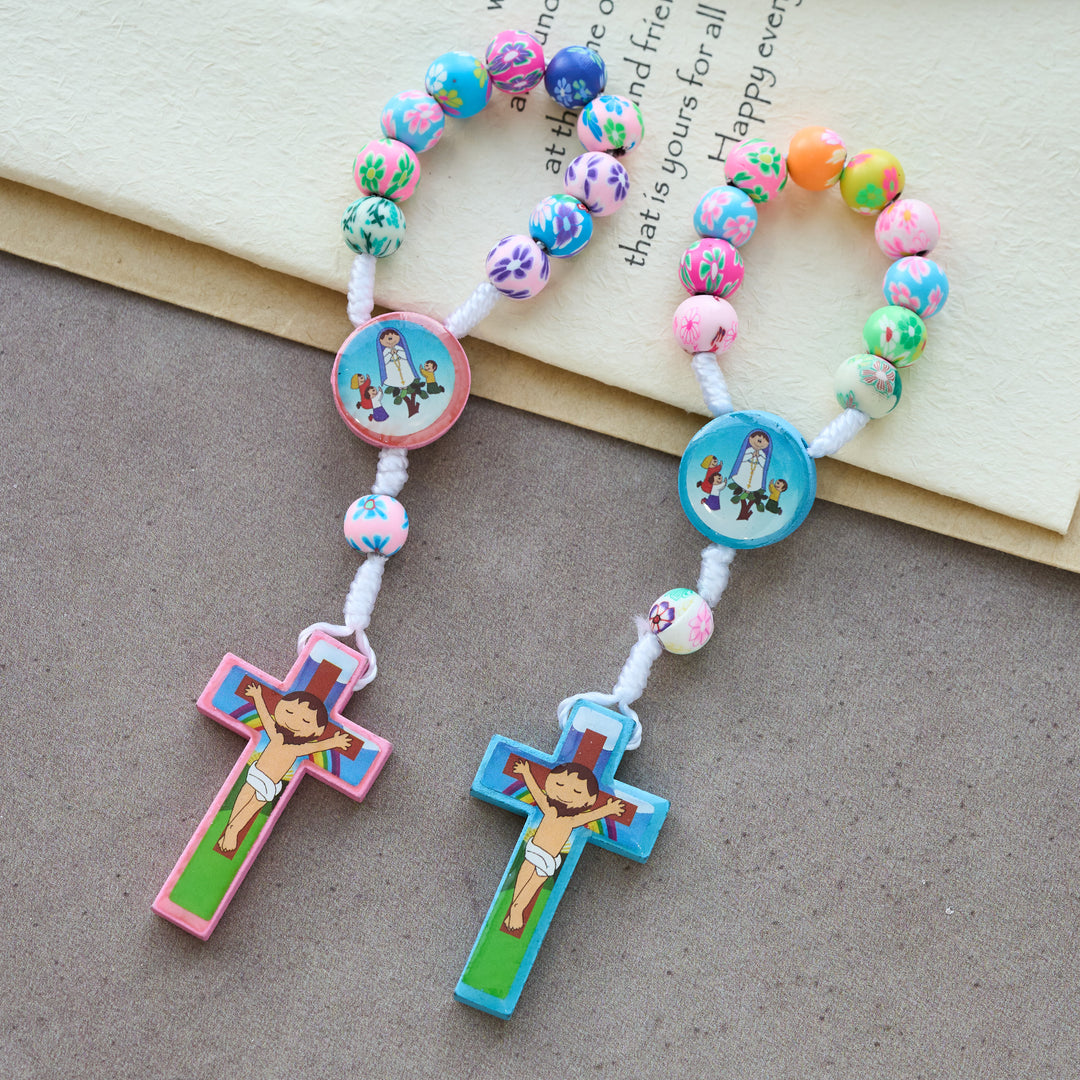 Christianartworkshop Rosario per bambini blu e rosa, braccialetto: perline colorate e simboli sacri per cuori giovani - Rosario blu - image 0