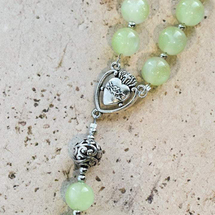 Rosario che cambia colore da verde a rosso con raggi UV di Christianartworkshop: perline Starlight e croce devozionale di Cristo - image 10