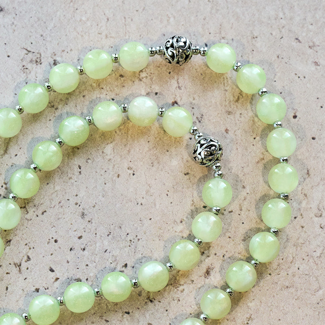 Rosario che cambia colore da verde a rosso con raggi UV di Christianartworkshop: perline Starlight e croce devozionale di Cristo - image 11