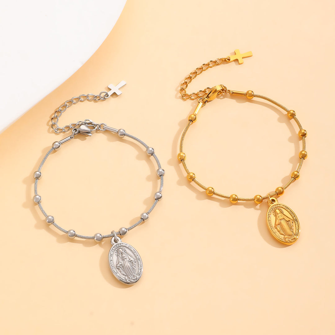 Bracciale con medaglia della Madonna e croce Christianartworkshop : promemoria di fede e cura da indossare ogni giorno - image 1