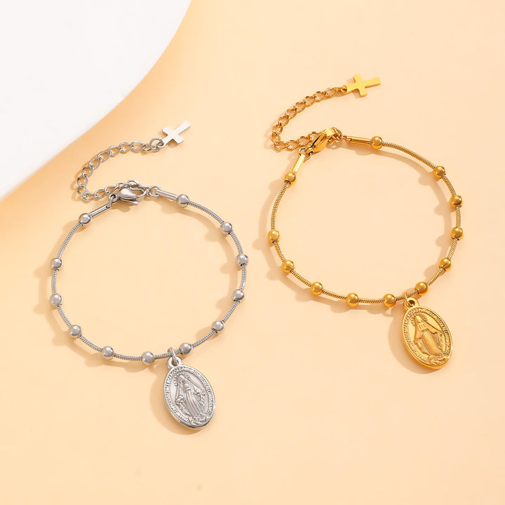 Bracciale con medaglia della Madonna e croce Christianartworkshop : promemoria di fede e cura da indossare ogni giorno - image 1