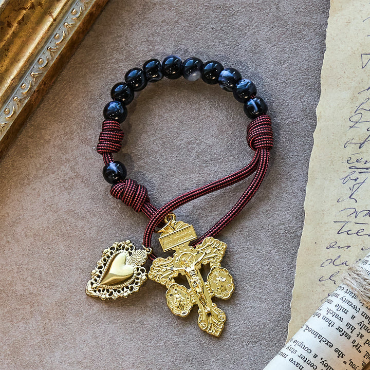 Rosario tascabile portatile Christianartworkshop: grani neri, cordino intrecciato e ciondolo sacro dorato - image 3