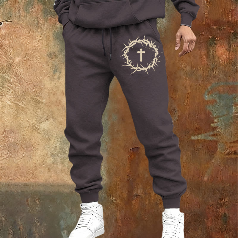 Pantaloni della tuta con corona di spine e croce Christianartworkshop : comfort intrecciato con grazia redentrice - image 1