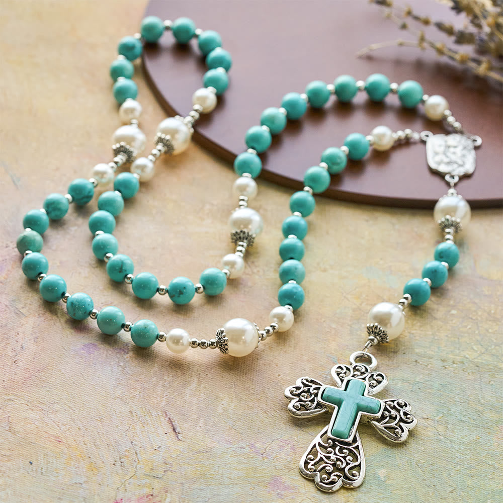 Rosario con crocifisso in perline turchesi di Christianartworkshop con accento della Sacra Famiglia: un promemoria costante della Sua grazia - image 2