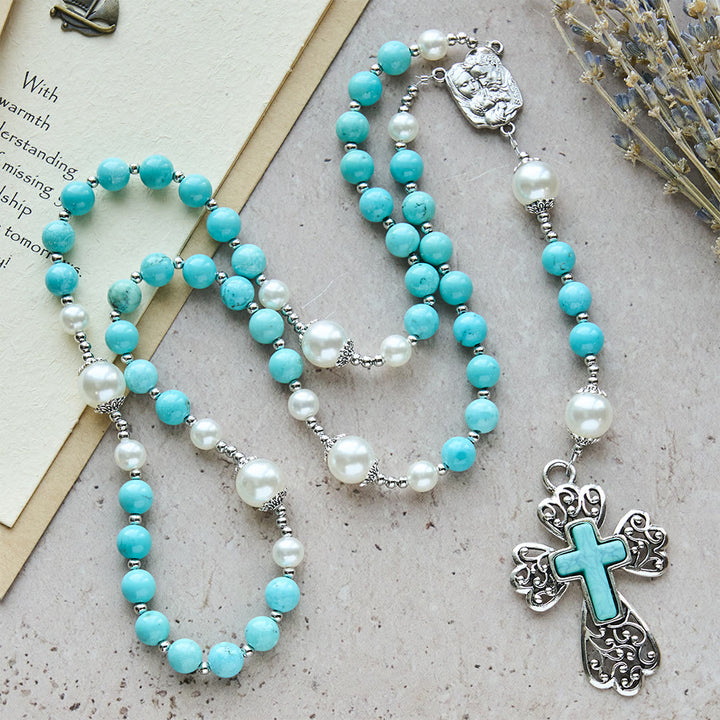 Rosario con crocifisso in perline turchesi di Christianartworkshop con accento della Sacra Famiglia: un promemoria costante della Sua grazia - image 5