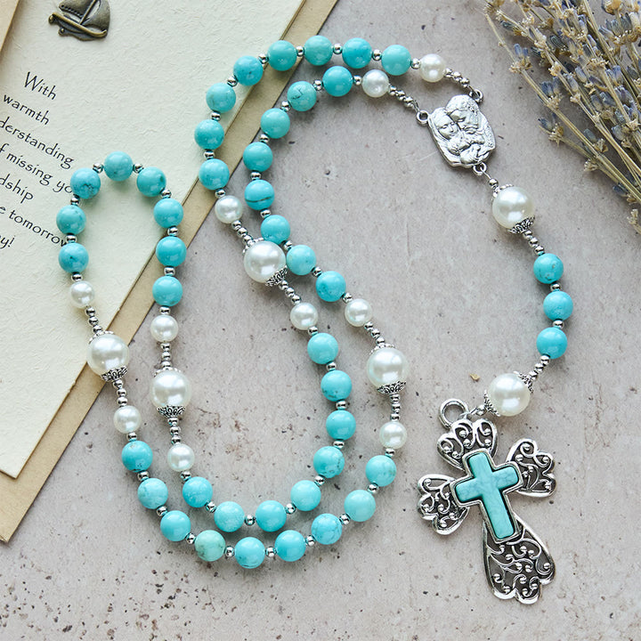 Rosario con crocifisso in perline turchesi di Christianartworkshop con accento della Sacra Famiglia: un promemoria costante della Sua grazia - Rosario con perline turchesi - image 0