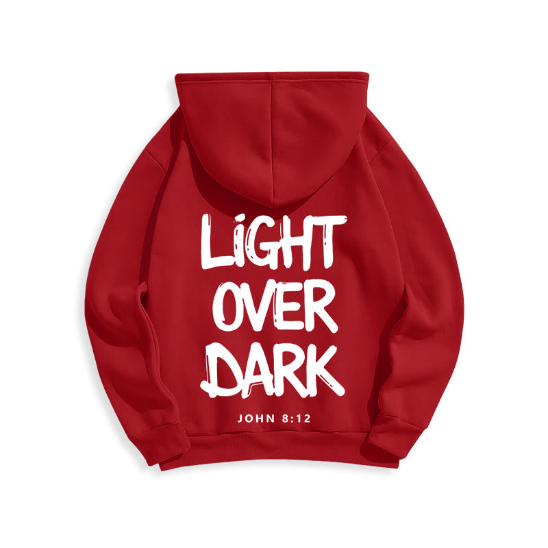 Felpa con cappuccio in poliestere foderata in pile con scritta "Light Over Dark" di John 8:12 Christianartworkshop - image 2