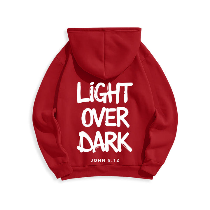 Felpa con cappuccio in poliestere foderata in pile con scritta "Light Over Dark" di John 8:12 Christianartworkshop - image 2