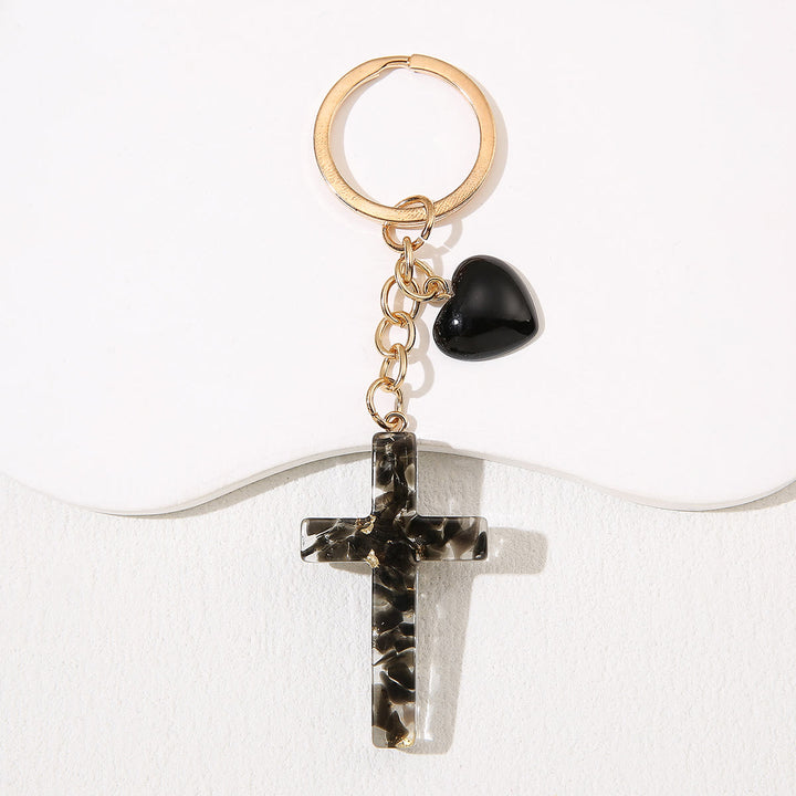 Portachiavi con croce in resina con accenti a forma di cuore di Christianartworkshop: tenera gioia per tutti - Nero - image 6